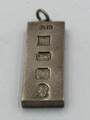 A 1977 hallmarked silver jubilee ingot pendant, approximate weight 31g