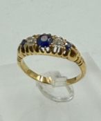 An 18ct gold ring approximate weight 3.5g and size M