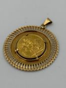 A 1926 sovereign coin in 18ct pendant mount with a combined approximate weight of 14.7g