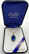 An Ariki pendant necklace featuring Paua Shell set in 22ct gold plate
