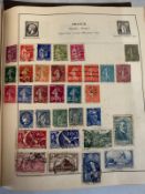 Five albums containing a variety of UK and world stamps of various denominations and ages