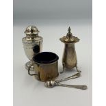 A mixed selection of hallmarked silver cruets, mustard has a blue glass liner, approximate total