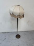 A brass pine column standard lamp