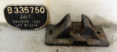 A cast iron railway wagon registration plate 1961 and a cast iron GWR railway bail chair 1902