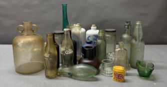 A selection of vintage glass including bottles and jars