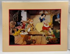 A 1994 Disney commemorative lithograph of Snow White and the Seven Dwarfs, gold stamp to bottom