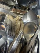 A large quantity of mixed metal flatware