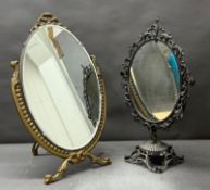 Two table top vanity mirrors in the rococo style.