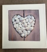 Box frame print of a heart of stones