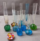A selection of bud vases and one paperweight