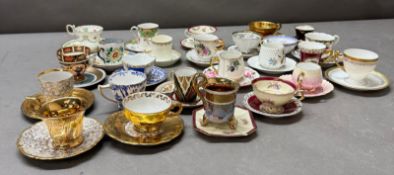 A large quantity of coffee cans and saucers