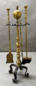 A brass fireside companion set