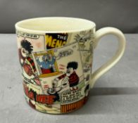 A Dennis the Menace Beano mug