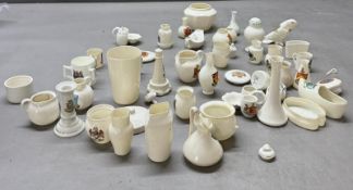 A large selection of British crested china souvenir ware