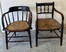Two smokers' bow or captains' chairs with spindle supports and curved armrests