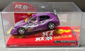 A RSCX tuning series seat Leon slot car in a display case