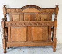 French oak bed featuring carved panel, aged colour and pattina and turned post, head and foot with
