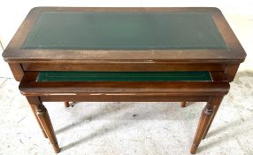 A nest of two mahogany tables with leather green inlay H44cm W76cm D37cm