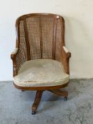 Maple and Co desk chair with cane back swivel action