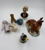 A selection of china, including 1920's porcelain half doll pin cushion and a Beswick deer
