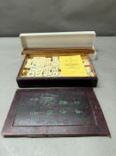 A Chinese Mahjong set in AF case along with later tile racks.