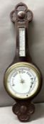 A vintage Banjo barometer with a carved oak case Approx 80cm