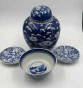 A selection of blue and white pottery, including a pair of Japanese bamboo pattern plates