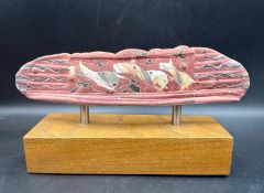 A Darryl Robertson pottery sculpture on metal supports and wooden block plinth, signed Verso.