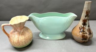 Three ceramics to include a Lord Nelson pottery centre piece vase, a top pitcher signed to base