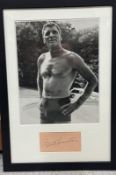 A framed signed black and white picture of Burt Lancaster 28cm x41cm
