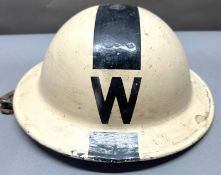 A British MKII steel helmet from World War II Worn and age related wear
