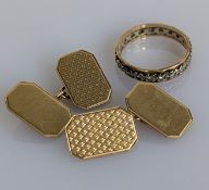 A pair of 9ct yellow gold cufflinks with engine turned design, hallmarked and a 9ct and silver etern