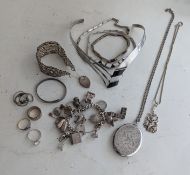 An assortment of silver jewellery to include a torc, matching necklace and necklace, together with a