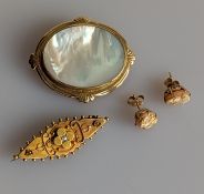 An Etruscan yellow gold brooch with diamond decoration, 40mm, hallmarked 15ct, 2.8g