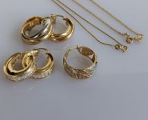 Two and a half pair of white and yellow gold earring, one pair gem-set, stamped 14k, test for 9ct 