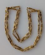 A 9ct yellow gold necklace with twist baton links, 66 cm, hallmarked, 12.4g