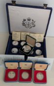 A cased Spinks 1990 Queen Mothers 90th Birthday Commemorative Silver Medallion, 82g, 57mm; two silve