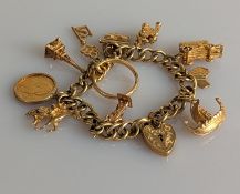 A yellow gold curb-link bracelet with nine charms, all hallmarked 9ct, together with a mounted half 
