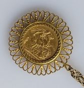 A Victorian gold full sovereign, 1893, mounted with a gold chain, both hallmarked 9ct, 19.5g