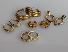 A pair of white and yellow gold earrings, stamped 585, 4.6g, and four other pairs in yellow gold