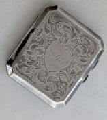 A George V silver cigarette case with seaweed etched decoration, 9 x 8 cm, hallmarked for Fred H Ada