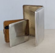 Two Art Deco silver cigarette cases with engine-turned design, one hallmarked for William Suckling