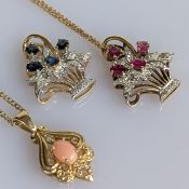 A yellow a white gold pendant chain with ruby and diamond decoration in the form of a bouquet, 23 x 