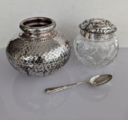 A planished silver vase with inverted rim, stamped 925, 9 cm H; a late Victorian silver-topped dress