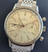 A 1960s Breitling Top Time 2002-33 manual chronograph wristwatch, serial no. for 1965, stainless 