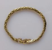 A yellow gold fancy-link bracelet with lobster clasp, stamped 585, 20 cm, 21.2g