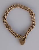 A rose gold flat curb-link bracelet with heart-shape clasp, 17 cm, hallmarked 9ct, 11.5g