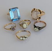 A three-stone graduated diamond crossover ring on an 18ct yellow gold and platinum setting