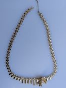 A vintage 9ct yellow gold fringe necklace, 12g