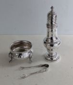 A Georgian-style silver salt with embossed decoration, lion mask knuckles on paw feet, 5h x 7 cm dia